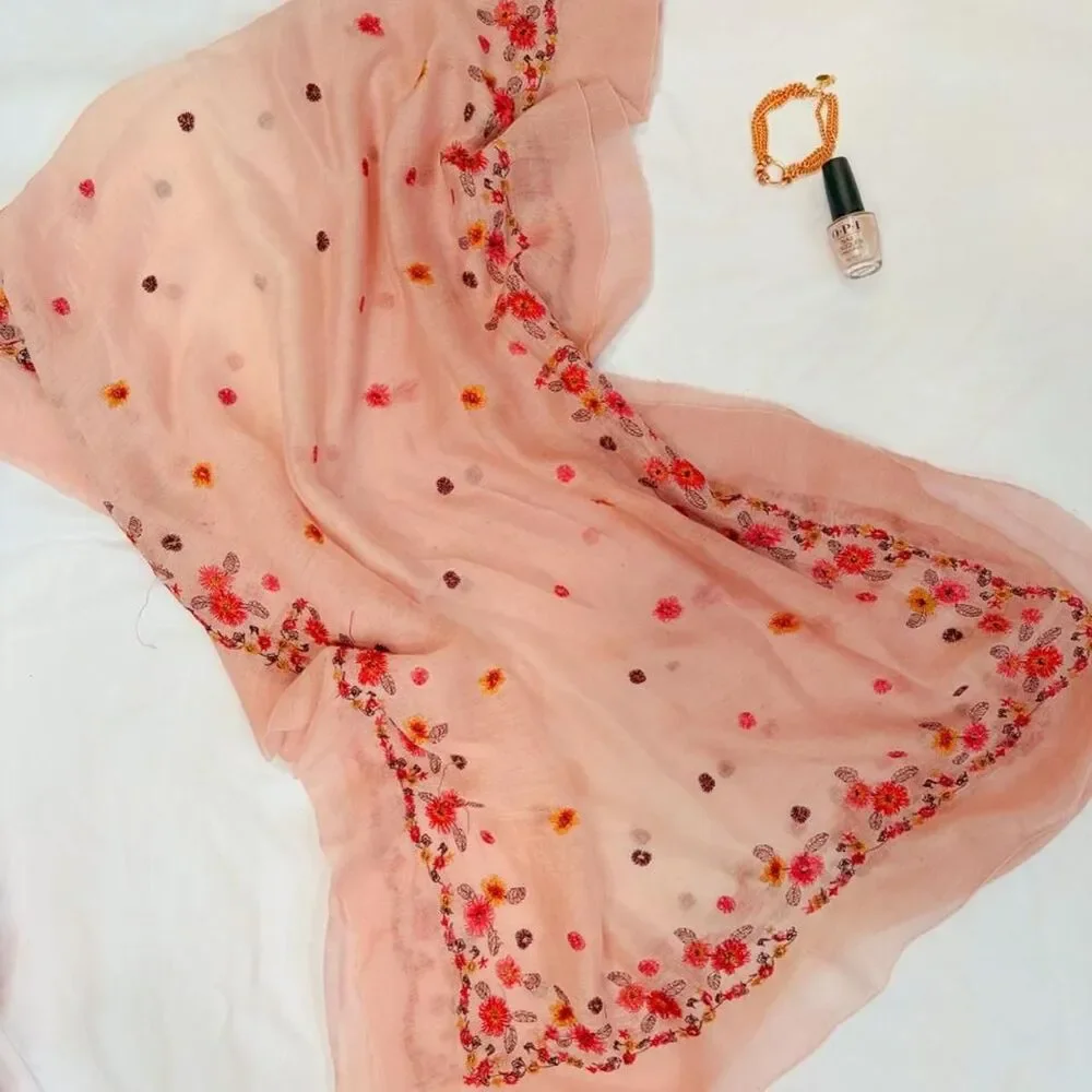 Light pink silk scarf featuring dainty floral embroidery